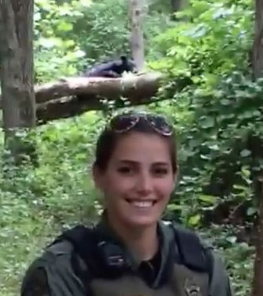 black-bear-photobombs-natural-resources-officers-wkyc